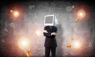 Businessman with monitor instead of head.
