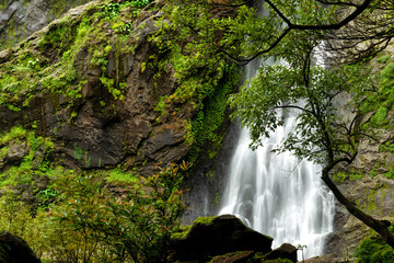 Beautiful waterfall in the national park forest at Khlong Lan Waterfall, Kamphaeng Phet Thailand