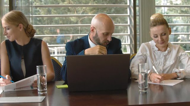Multi-ethnic business group discussing idea, new business projects at conference table