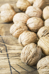 Walnuts on dark vintage wooden background. Walnut healthy food