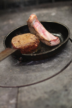 cooking meat on stove