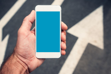 Hand with smartphone mock up copy space