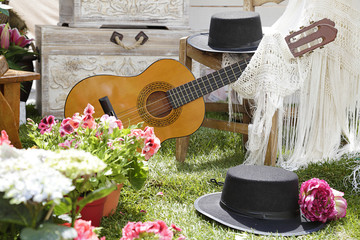 Classic spanish guitar with flamenco elements and flowers