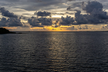 A beautiful Florida gulf coast sunset after an evening thunderstorm has passed through the area. Fort Island Gulf Beach, in Florida's Citrus County, is a popular spot to view these sunsets.