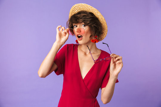 Portrait of a pretty young girl in straw hat