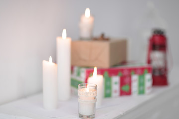 blurred image. candles and gift boxes .photo with copy space