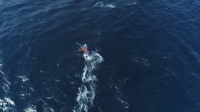 Aerial shot of windsurfers surfing at sea. Extreme windsurfing - July 2018: Adriatic Sea, Croatia