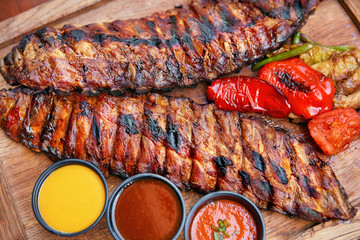 Food. Grilled Meat And Vegetables With Sauce Closeup
