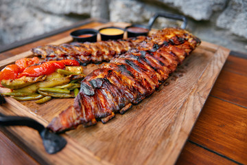 Food Closeup. Grilled Ribs In Barbecue Restaurant