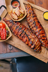 Food Closeup. Grilled Ribs In Barbecue Restaurant