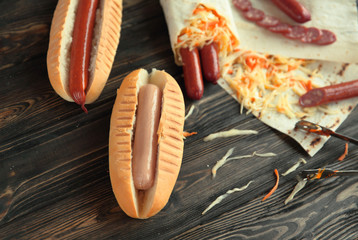 preparation of hot dogs with sausage and sausages