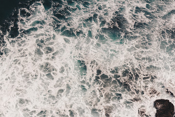 Texture waves and rocks in the sea  bali indonesia