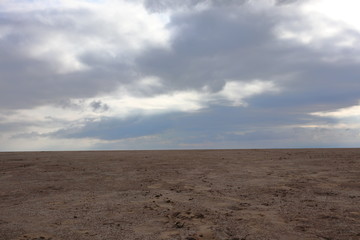 Fototapeta na wymiar Cloudy sky above the desert