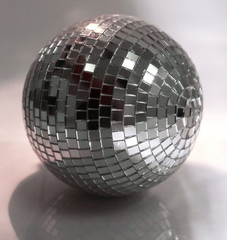 mirror ball.isolated on a dark background in the photo with copy space