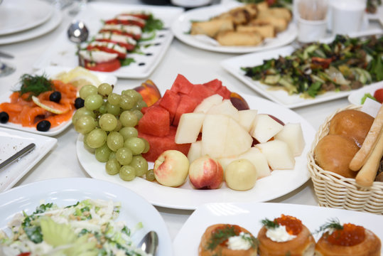 Buffet table with food. An abundant feast for gluttons.