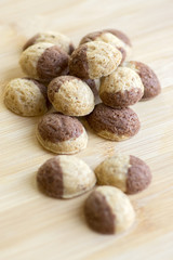 Cinnamon sandbakelse christmas cookies, two color, cocoa dark brown and vanilla light golden brown, delicious czech cookies