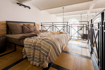 Mezzanine bedroom with double bed - obrazy, fototapety, plakaty