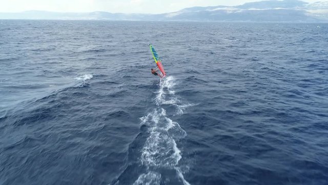 Aerial shot of windsurfers surfing at sea. Extreme windsurfing - July 2018: Adriatic Sea, Croatia