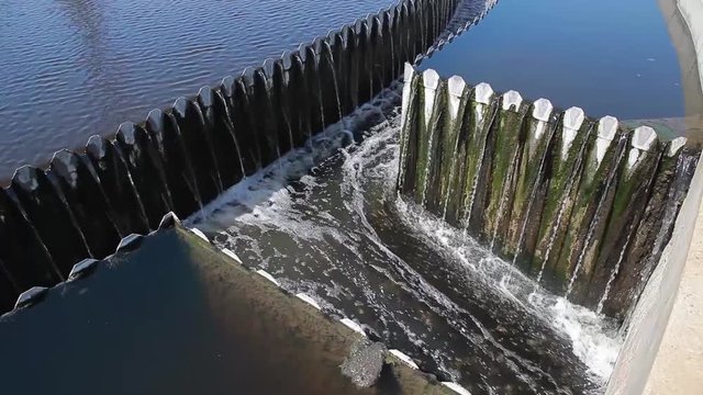 Channels for filtration and water purification at a water treatment plant. Environmental pollution. Recovered and purified water.