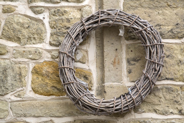 Branch Circle on Stone Wall