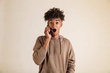 Portrait of a surprised young afro american man