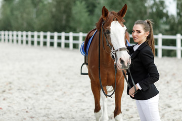 Rider elegant woman riding her horse outside