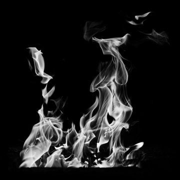 Abstract flame. Black and white image. Natural element on the black background.