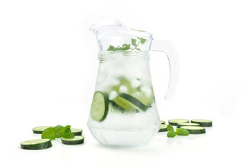 Cucumber and mint lemonade in a jar on a white background with copyspace