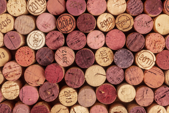 Naklejki Wine corks background, overhead photo of red and white wine corks