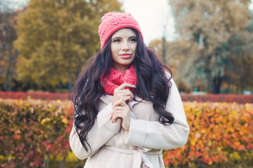 Pretty woman outdoors. Beautiful girl in fall park