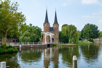 Historical Eastern Gate and drawbridge over the canal in Delft, Netherlands