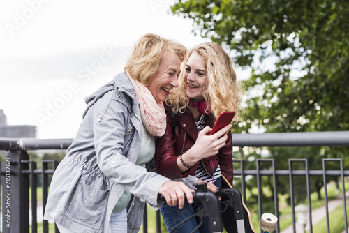 Grandmother and granddaughter having fun together