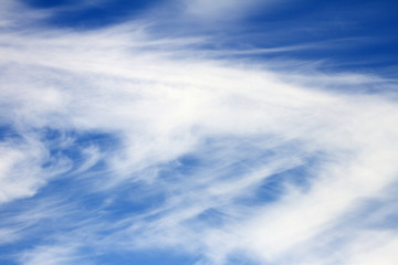 Sky clouds background. Spindrift white clouds in the blue sky in the morning