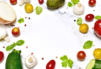 Fresh vegetables, arrangement on a white marble background with copy space.