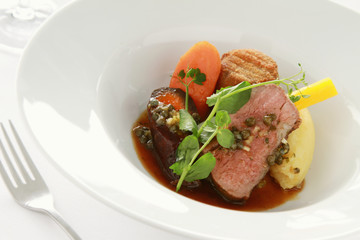 plated lamb main meal