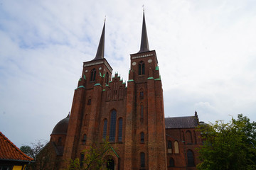 Roskilde Cathedral is a cathedral of the Lutheran Church of Denmark. The first Gothic cathedral to be built of brick, it encouraged the spread of the Brick Gothic style throughout Northern Europe