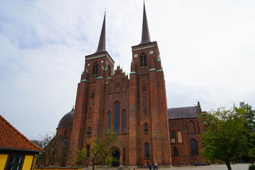 Roskilde Cathedral is a cathedral of the Lutheran Church of Denmark. The first Gothic cathedral to be built of brick, it encouraged the spread of the Brick Gothic style throughout Northern Europe