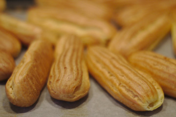 billets for eclairs on a baking sheet