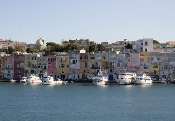 Fototapeta na wymiar Procida's view of the port. Colorful village. Italian's island near Naples