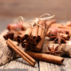 cinnamon on wood background