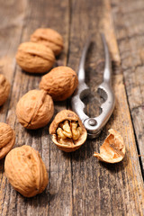 walnut on wood background