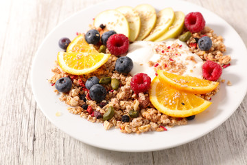 healthy breakfast with muesli and fruits