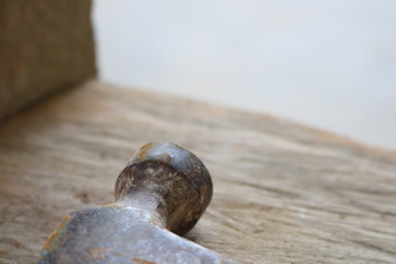 Spikes and hammers on a wooden table