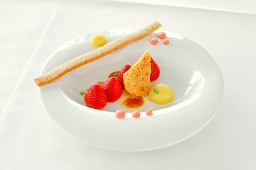 plated strawberry dessert