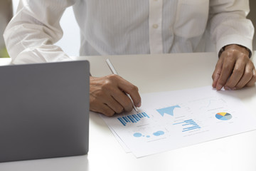 businessman analyzing business paperwork