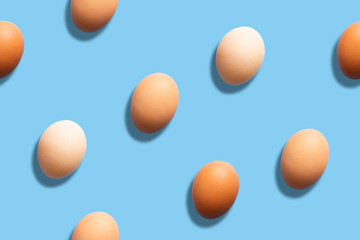 Eggs flatlay on color background. Pattern seamless wallpaper backdrop illustration