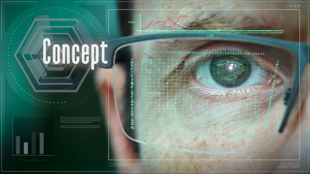 A close up of a businessman eye controlling a futuristic computer system with an Concept idea.