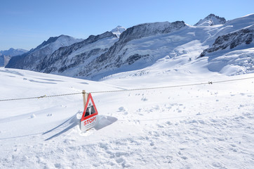 Stop sign in the snow, Jungfrau, Switzerland