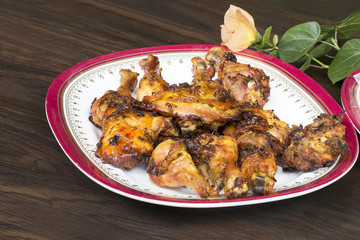 Thai food and traditional menu.Roast chicken and sticky rice with dish on wood.Close up.