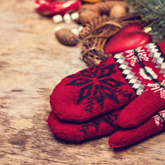 gift, fir branch, nuts, cones, Cocoa, coffee, cozy knitted blanket. Winter, New Year, Christmas still life.